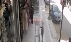 Yanındaki Küçük Çocuğa Aldırmadan Elbise Çalan Kadın Kameralara Yakalandı